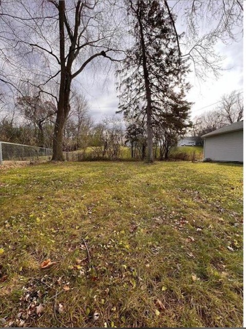 Large backyard, not pictured toolshed. - 419 Sylvan St