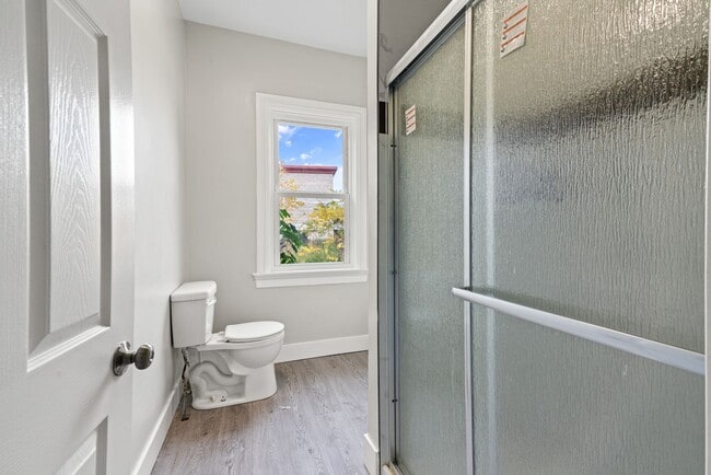 Building Photo - Spacious 3-Bedroom Home with Sunroom & Off-Street Parking in Johnston!