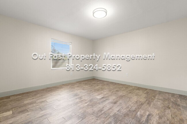 Building Photo - Private Yard Living with Recent Upgrades in Central Tampa