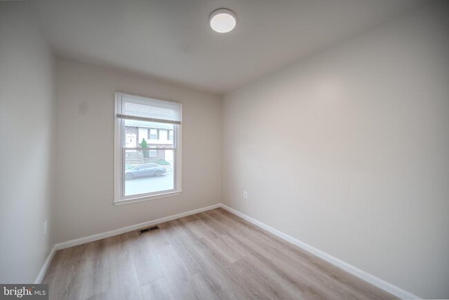 Building Photo - 11209 Caroline Ave