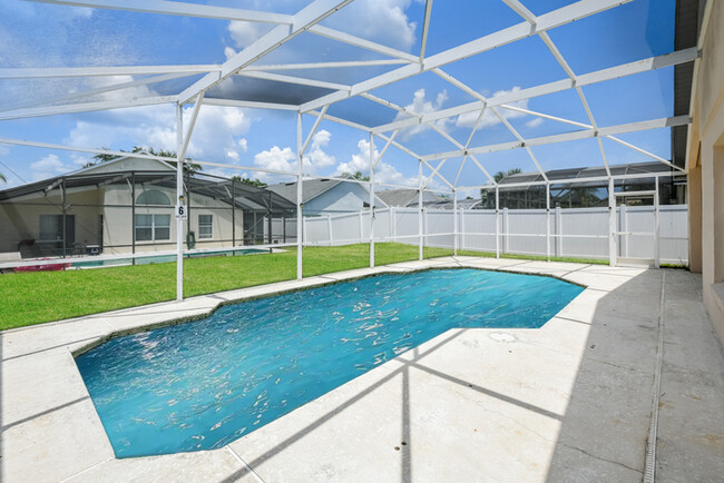 Building Photo - Spacious 4-Bedroom Home with Enclosed Pool