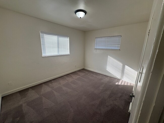 Building Photo - $1000 off first months rent!!  Spacious 4 bedroom 2 bath house with large backyard!