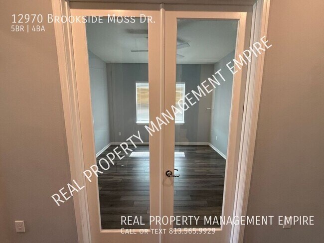Building Photo - 12970 Brookside Moss Dr