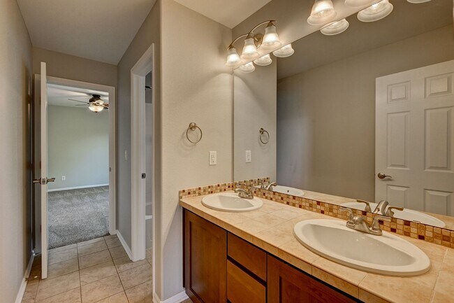 Building Photo - 5 bedroom, 4 bath home with 2 car attached garage