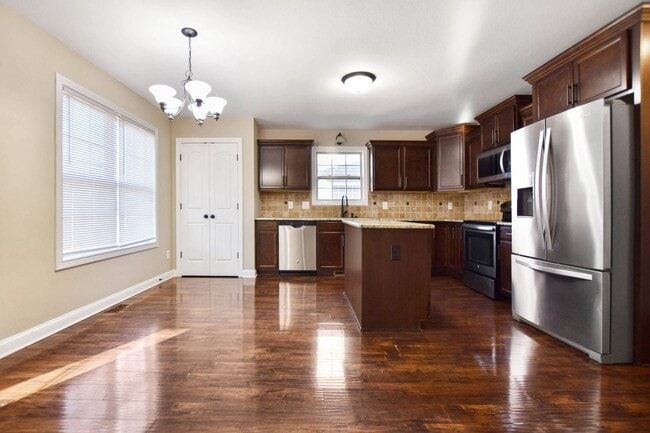 Building Photo - Pet Friendly Three Bedroom with Bonus!