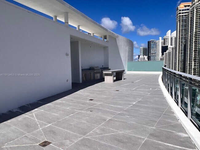 Building Photo - 17550 Collins Ave