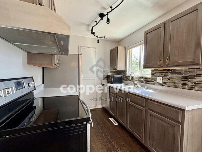 Building Photo - 10536 W 107th Ave