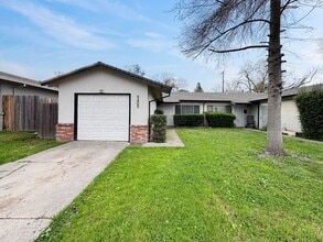 Building Photo - 2BR/1BA House w/ Fenced Yard + Garage In Carmichael