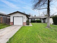 Building Photo - 2BR/1BA House w/ Fenced Yard + Garage In Carmichael