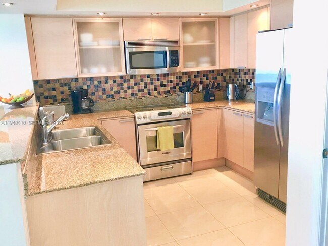 Building Photo - 16699 Collins Ave