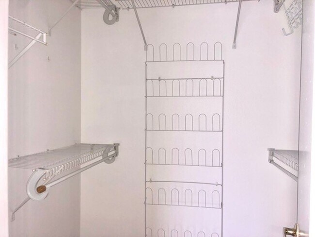 Building Photo - Nice 2X2 located on 2nd floor- Tile & lami...