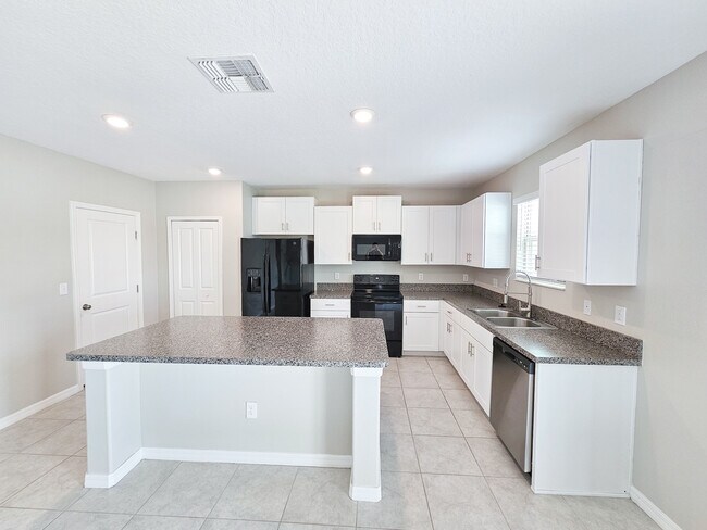Building Photo - 10520 Strawberry Tetra Dr