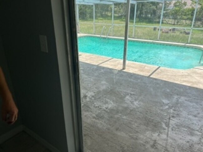 Building Photo - Large  3 bedroom, 2 bath pool home.
