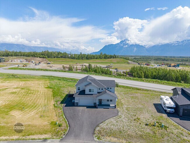 Building Photo - Premium 4BR Rental in The Ranch | Stunning Mountain Views | Easy Community Location | Automatic G...