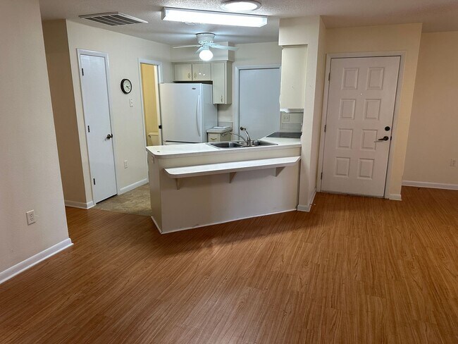 Building Photo - Experience Maintenance-Free 55+ Living at The Cove at Tavares Village!