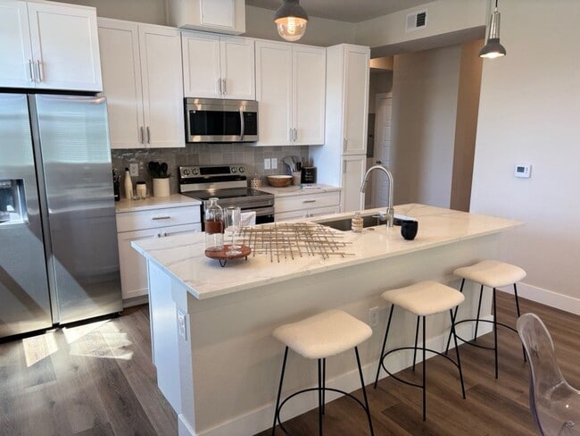 Building Photo - Modern 2B/2B Apartment – Steps from Light Rail & Sloan’s Lake!