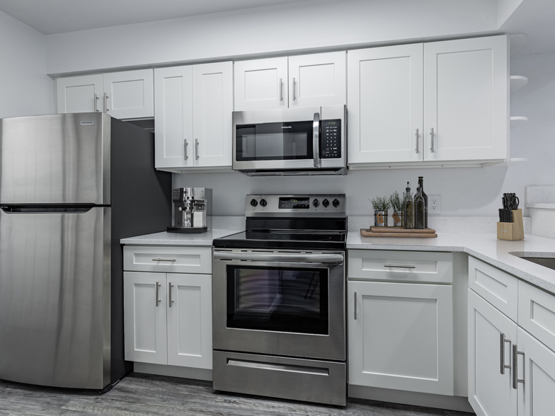 Kitchen with White Finishes - Cobblestone