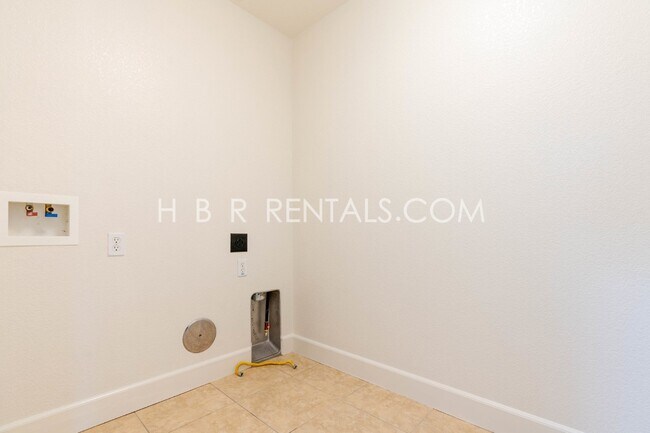 Building Photo - Spacious 4-Bed, 3-Bath Home with a Beautiful Garden in Mountain House! *FIRST FLOOR BEDROOM and F...