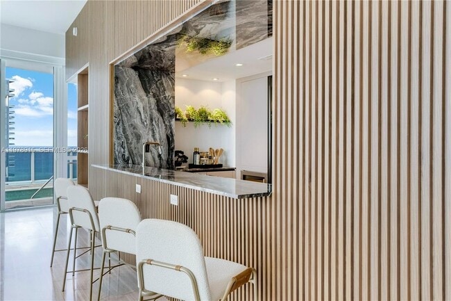 Building Photo - 18201 Collins Ave