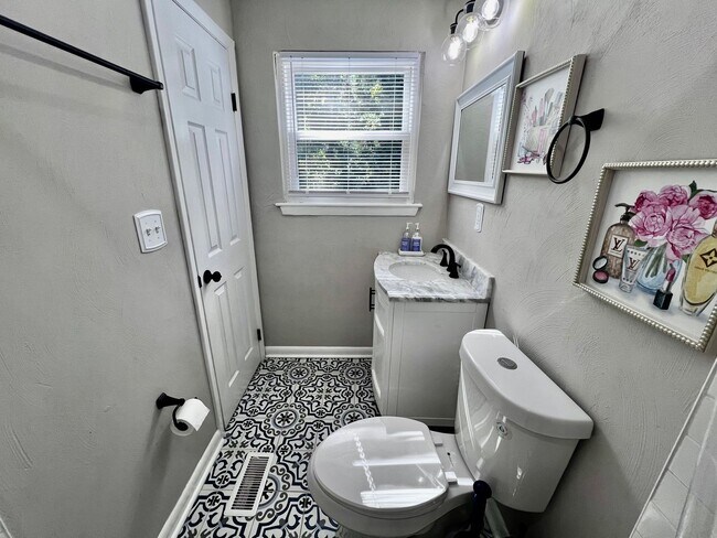 Building Photo - Come see this FULLY renovated two-story tr...
