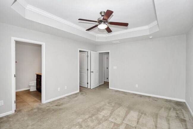 Building Photo - Stunning 3 Story 3BD/2+2HalfBA Townhome in...