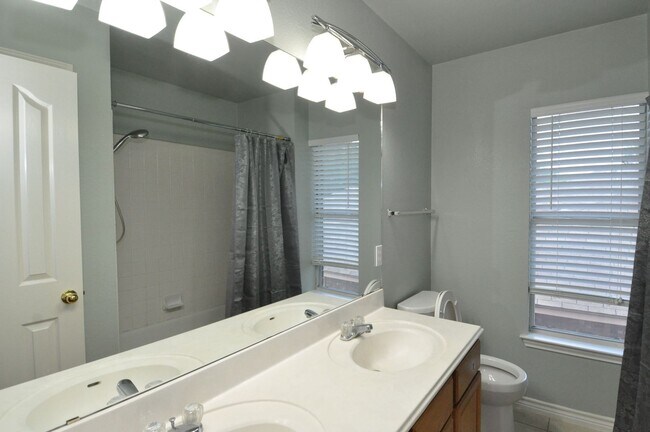 Building Photo - Spacious home for growing family with multiple dining and living areas! HUGE backyard!