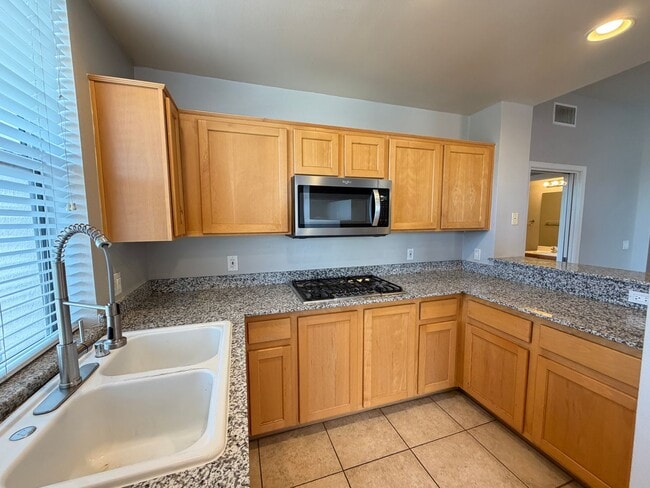 Building Photo - Terrific 2-Bedroom Condo in Guard gated community