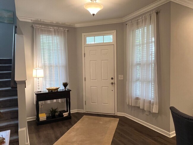 Building Photo - FURNISHED Three Bedroom Wellstone Model Home
