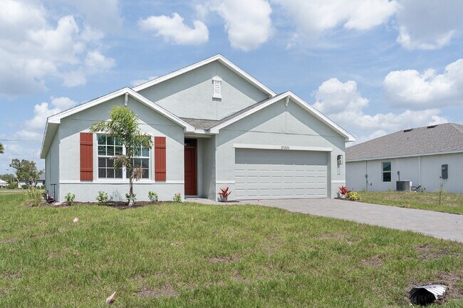 Building Photo - Spacious 4-Bedroom Gem with 2 Full Baths in Charming Punta Gorda Oasis!