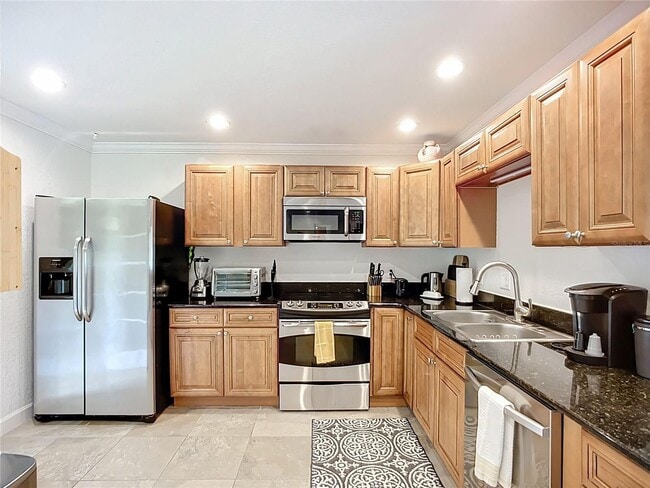 Building Photo - Fully Furnished 2BR/2BA Condo in the Heart...