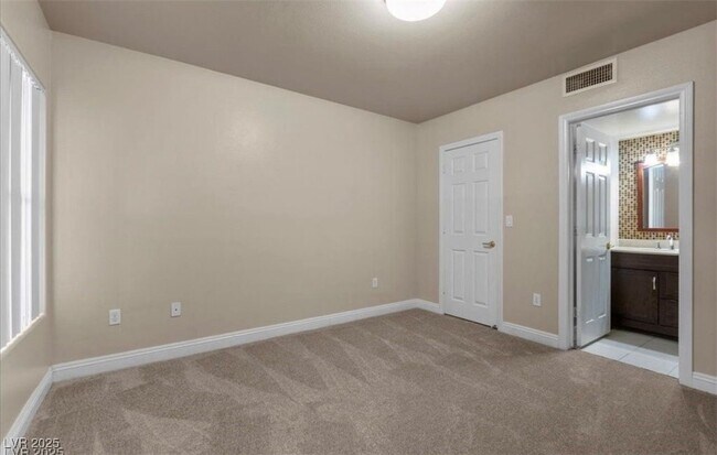 Building Photo - 8000 W Badura Ave