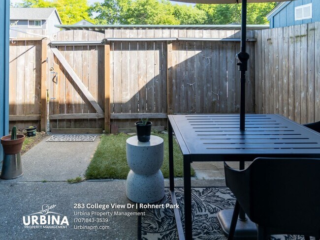 Building Photo - Two Bedroom Townhouse with Private Patio and Community Pool