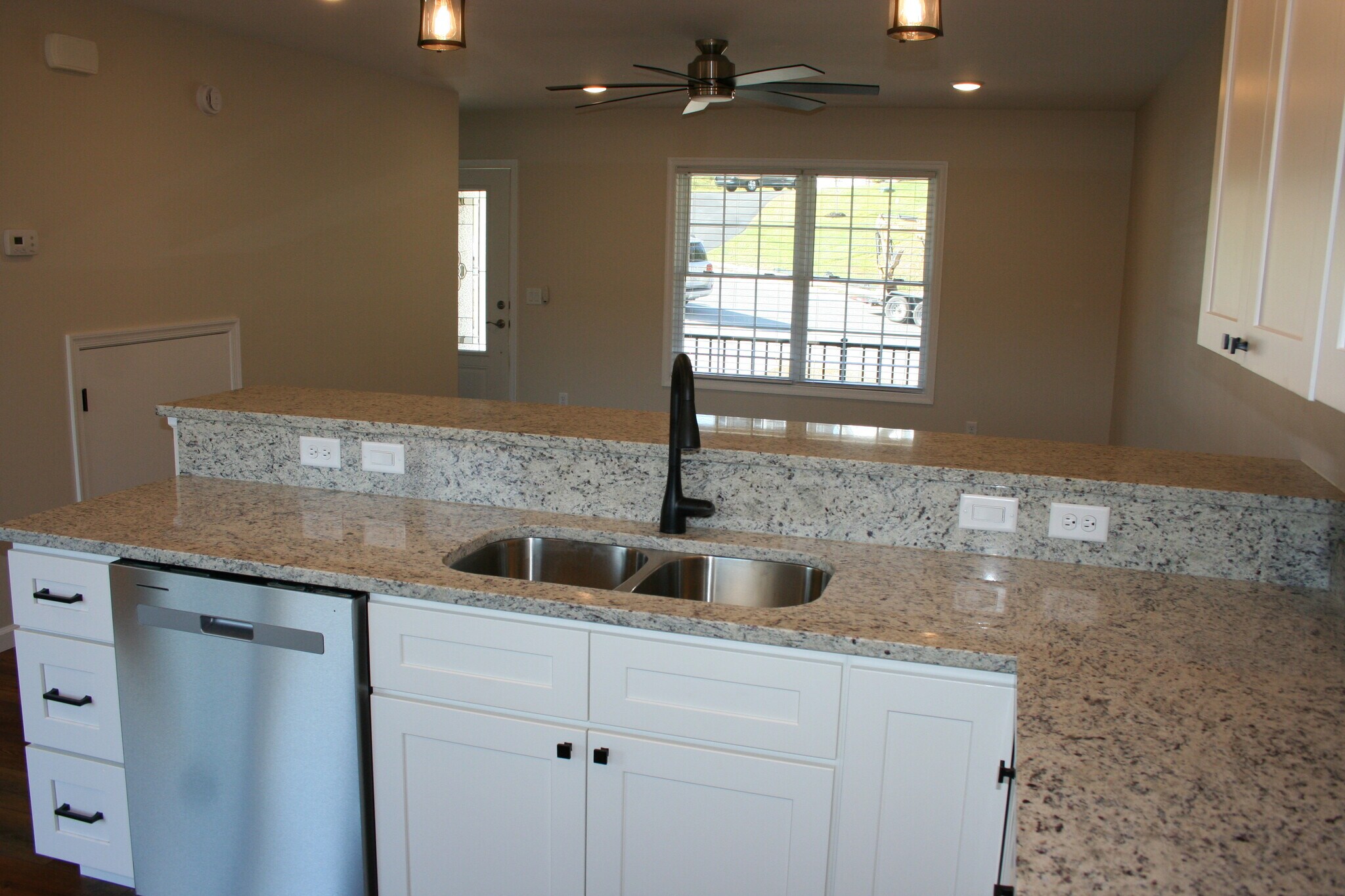 Granite tops and elevated counter for additional seating - 2720 Dorval Rd