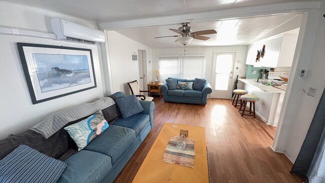 Building Photo - Beautiful fully furnished one bedroom, one bath manufactured home in a 55+ deed restricted gated ...