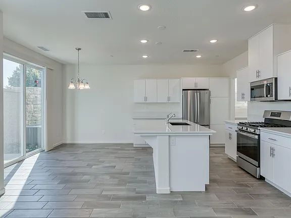 Building Photo - NEW! Modern, Wilson Home. 3 bedrooms / 2.5-bathroom single-family home in a quiet gated community...