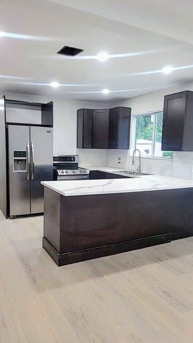 Building Photo - 2310 NW 103rd St