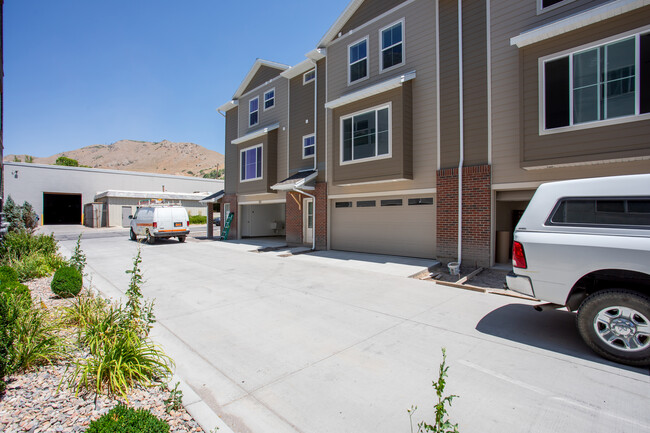 No opposing garages on the driveway. You have a two car garage and a third parking place. - 361 W Reed Ave