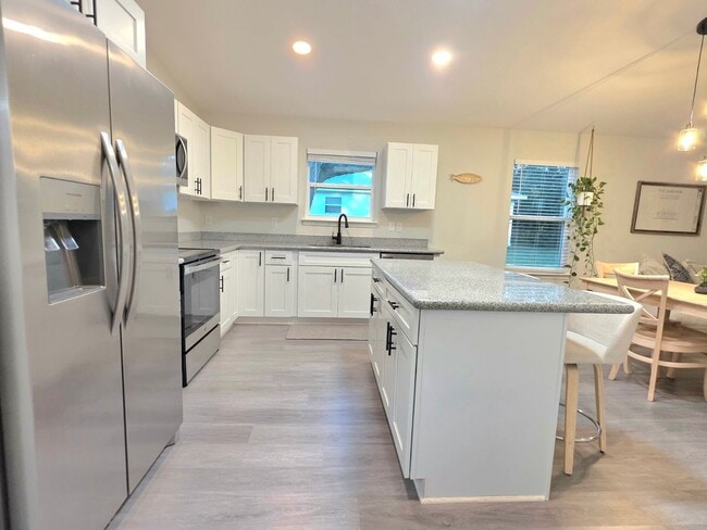 Building Photo - Discover the Style & Comfort in this new 3 Bedroom, 2 Bath Home.