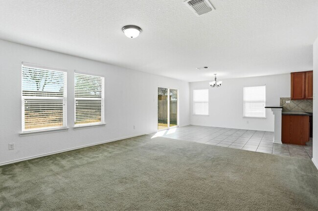 Building Photo - Spacious 4-Bedroom Home with Flexible Floor Plan in Growing West San Antonio