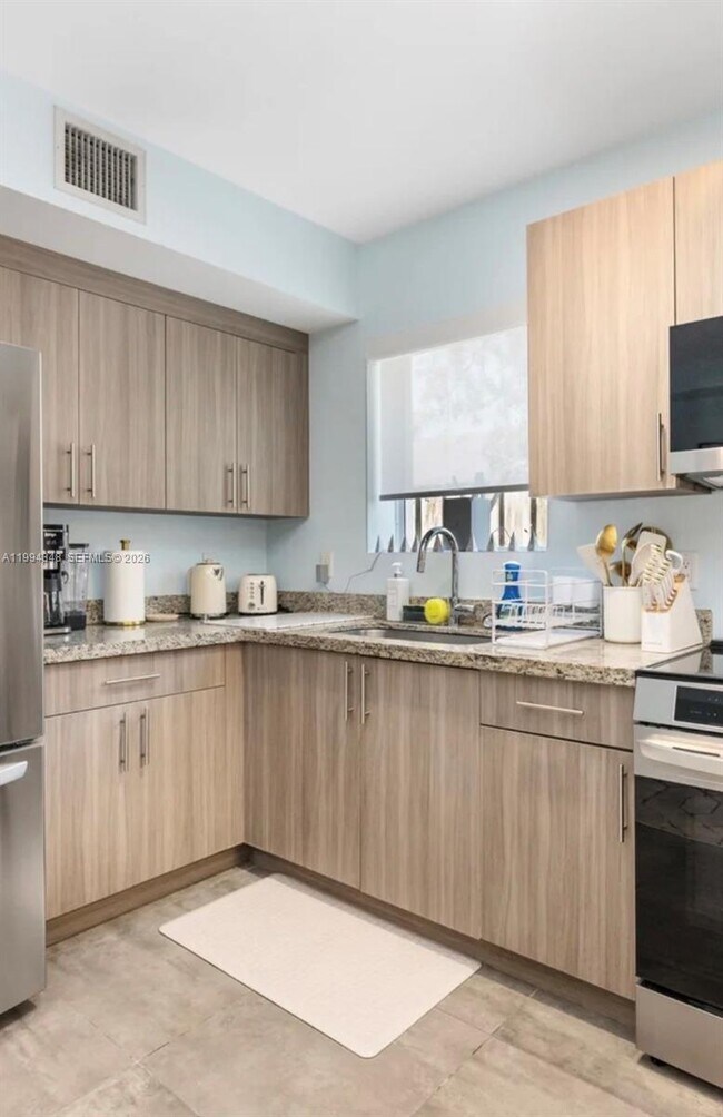 Building Photo - 165 NW 39th St