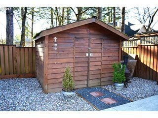 Building Photo - Quiet and Private Set in Forested Neighbor...