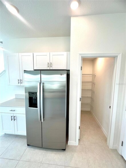 Building Photo - 8795 Coqui Song Ln