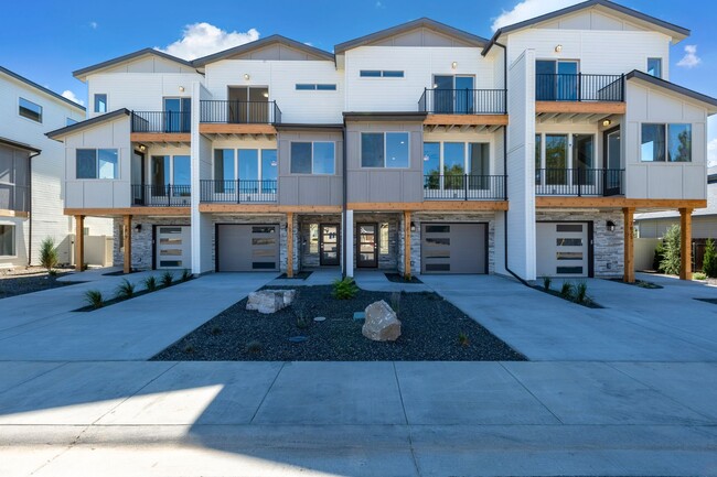 Primary Photo - SOLAR POWERED TRI-LEVEL TOWNHOME BLENDS MO...