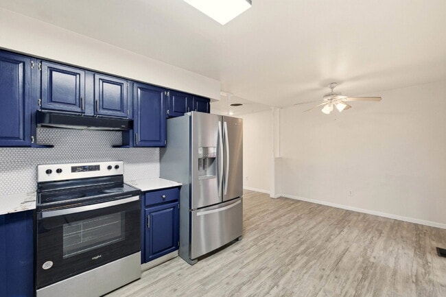 Building Photo - Split Level Home Features 4BD/2BA, Large Backyard and Deck. Newly Renovated Kitchen!  Convenient ...