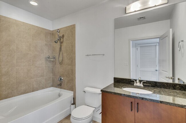 Building Photo - Stunning condo in the heart of SoBro at the Encore! Beautiful 1 bed, 1 bath on the amenity floor ...