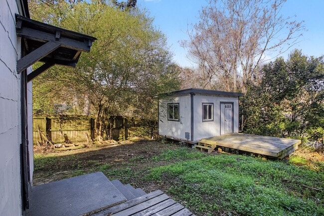 Building Photo - Move-In Ready Home with Hardwood Floors & Detached Workshop