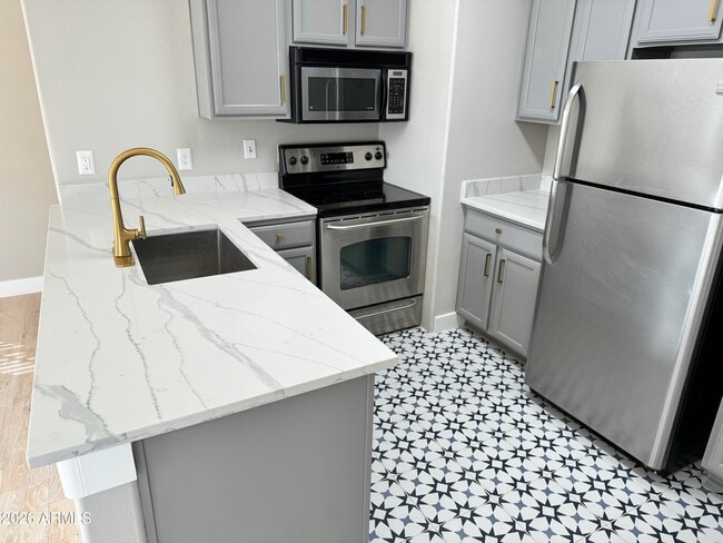 Building Photo - 2134 E Broadway Rd