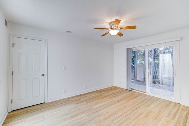 Building Photo - Spacious 2-Bed Duplex with Private Backyar...