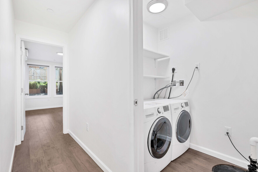 Laundry room and view down hallway - 5333 42nd St NW