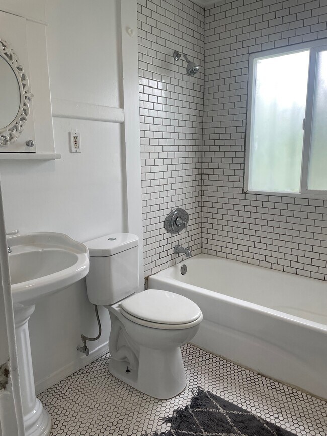 bathroom with subway tile - 1250 N Citrus Ave
